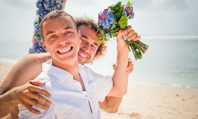 Male-honeymoon-couple-on-beach